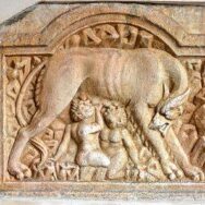 Statue of Romulus and Remus nursing from a wolf carving