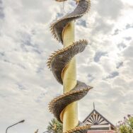 Phaya Nak, the water serpent coiled around a tree trunk