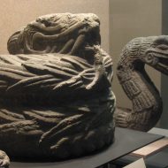 Mythlok - Feathered Serpent stone carving