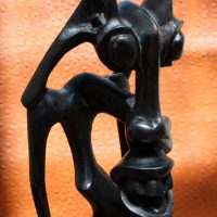 Mythlok - Shetani carving