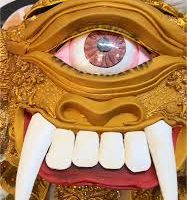 Mythlok - Bungisngis mask Artwork of Bungisngis, the one-eyed giant from Philippine mythology, laughing with its trademark wide grin