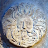 Mythlok - Grannus disc Carving of Grannus’s face on a disc