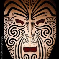 Mythlok - Ruaumoko mask Decorative Ruaumoko mask featuring bold lines and symbolic facial expressions.