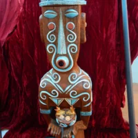 Mythlok - Ruaumoko tiki Ruaumoko tiki carving with traditional patterns representing volcanic and earthquake energy.