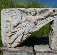 Mythlok - Bia stone carving Stone carving of Greek Goddess Bia