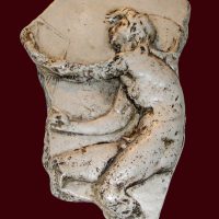 Mythlok - Caerus carving Carving showing Greek god Caerus