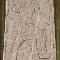Mythlok - Baal tablet A carving of the storm god Baal
