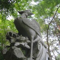 Phoenix statue. A park south of the city. Nanning, Guangxi. Statue of the Chinese phoenix, Fenghuang