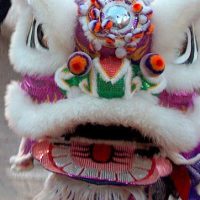 Mythlok - Nian costume Performer wearing a costume of the Chinese Hybrid Nian